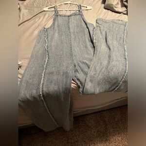 Super cute, never worn Jumpsuit! Size small. Too long for me.
